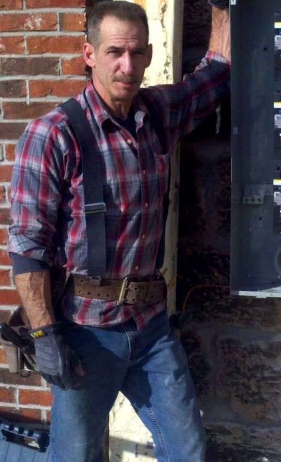 Charles on the job at a commercial meter bank